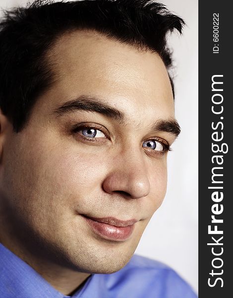 Attractive man portrait, closeup,looking at camera