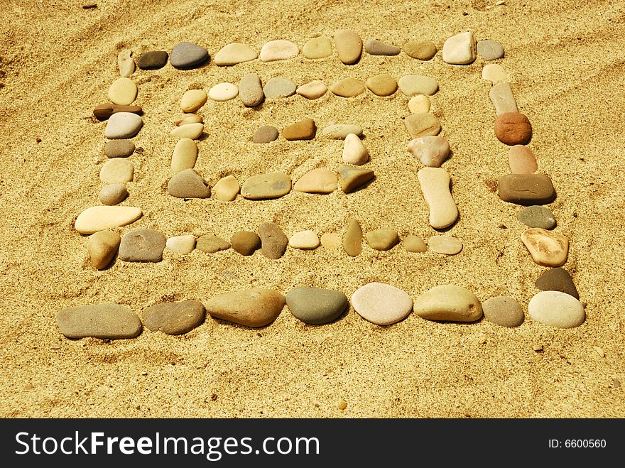 Stones on sea sand, a background. Stones on sea sand, a background