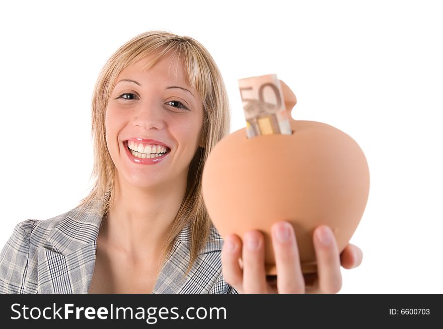 Young smiling woman holding a piggy bank isolated over white background