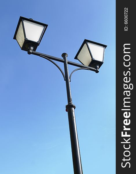 Retro lantern on blue ground