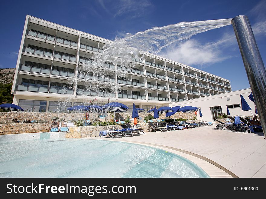 Water spray  and luxury resort hotel