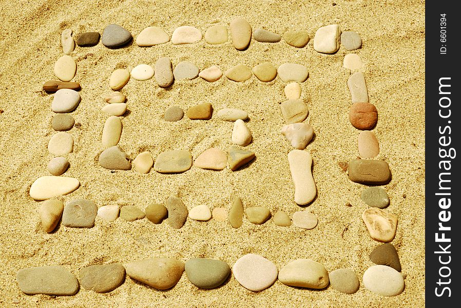 Stones on sea sand, a background. Stones on sea sand, a background