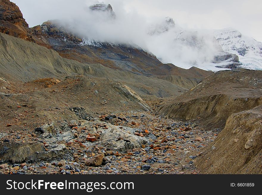 Glacier moraine in the mountain in the early fall