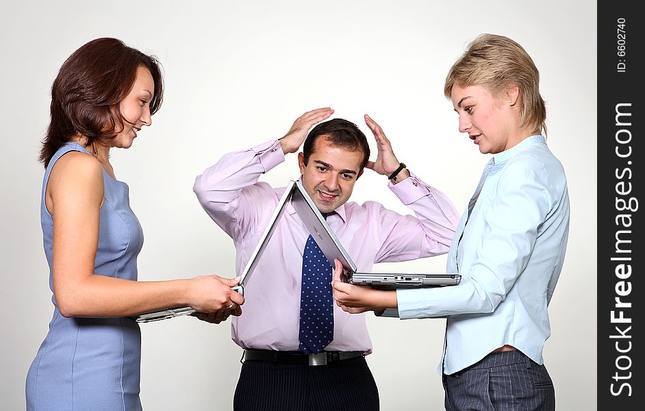 Teamwork under stress concept: business colleagues. Teamwork under stress concept: business colleagues