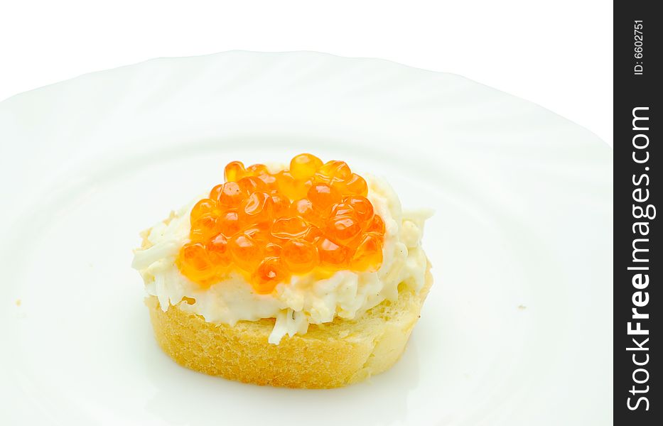 Caviar sandwich on white plate, isolated on white