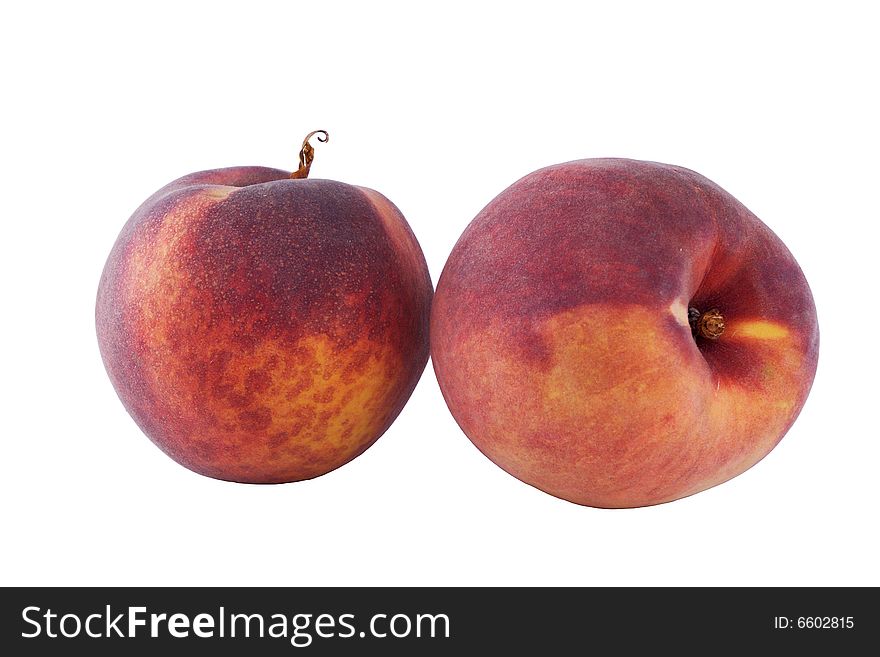 Pair of ripe peaches on white