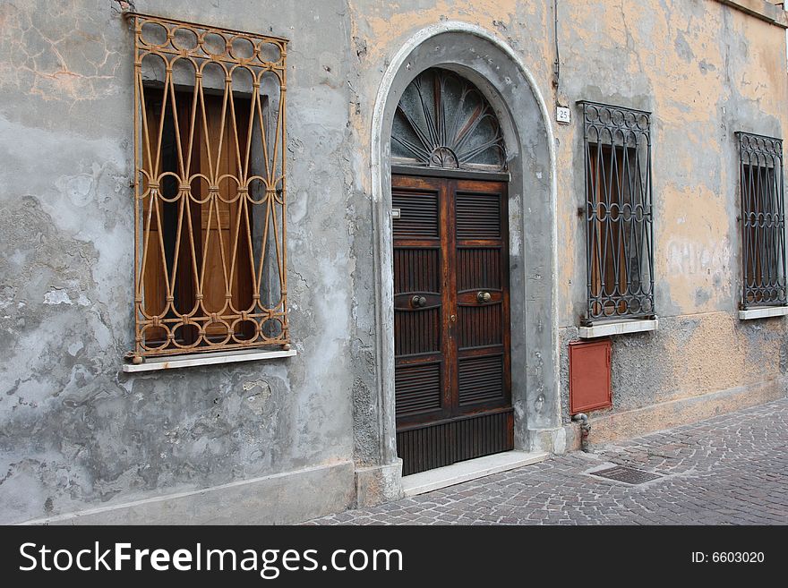 Wooden front door and windows in old house