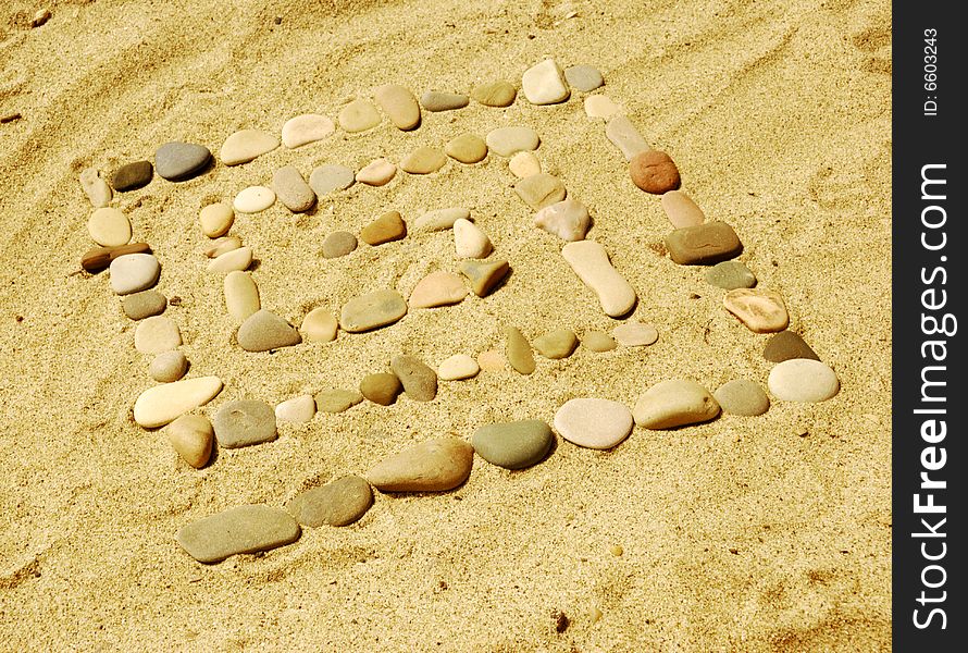 Stones on sand