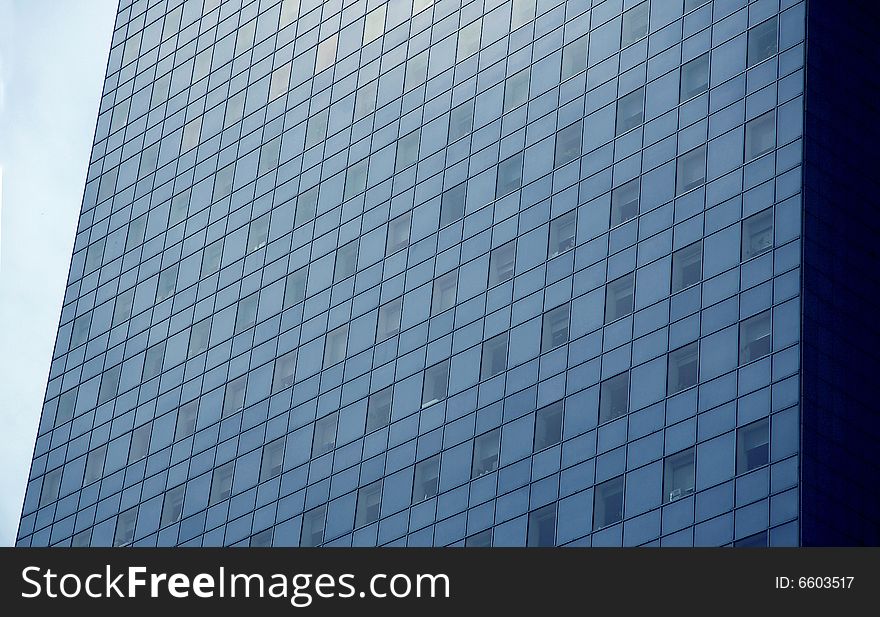 Great low angle view of a modern steel and glass building. Great low angle view of a modern steel and glass building