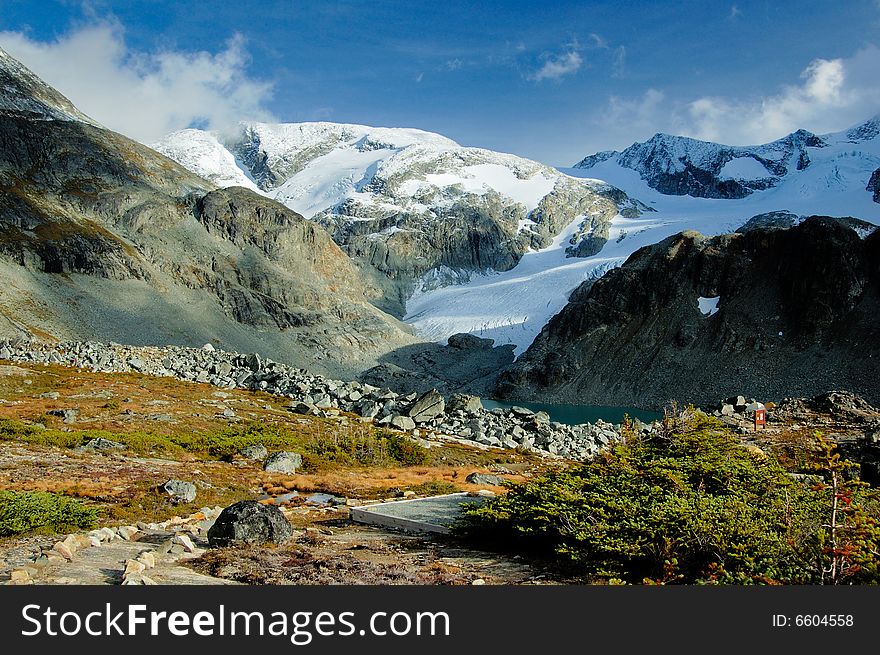 Glacier moraine in the mountain in the early fall