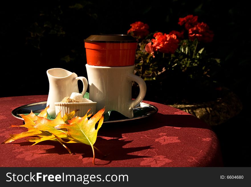 Autumn tea and milk on the table