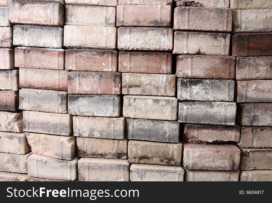 Stack of construction bricks which can be used as a wallpaper background