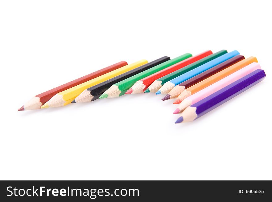 Closeup of a collection of bright color pencils. Isolated on white. Closeup of a collection of bright color pencils. Isolated on white.