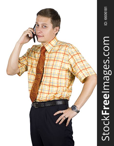 Young, elegant European businessman, wearing suit, shirt and tie. Smiling friendly. Talking on mobile phone. Young, elegant European businessman, wearing suit, shirt and tie. Smiling friendly. Talking on mobile phone.