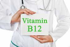 Vitamin B12 Written On A Card In Doctors Hands Royalty Free Stock Image Vitamin B12 Written On A Card In Doctors Hands Royalty Free Stock Image