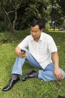 The Man Using Cell Phone Royalty Free Stock Photos