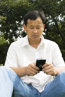 The Man Using Cell Phone Royalty Free Stock Images
