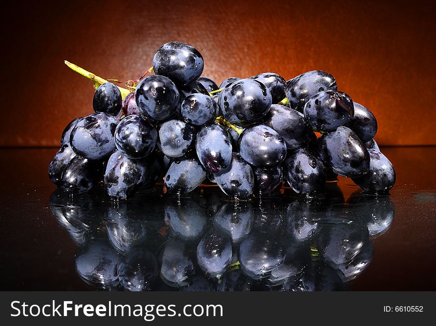 Black grapes on a dark background