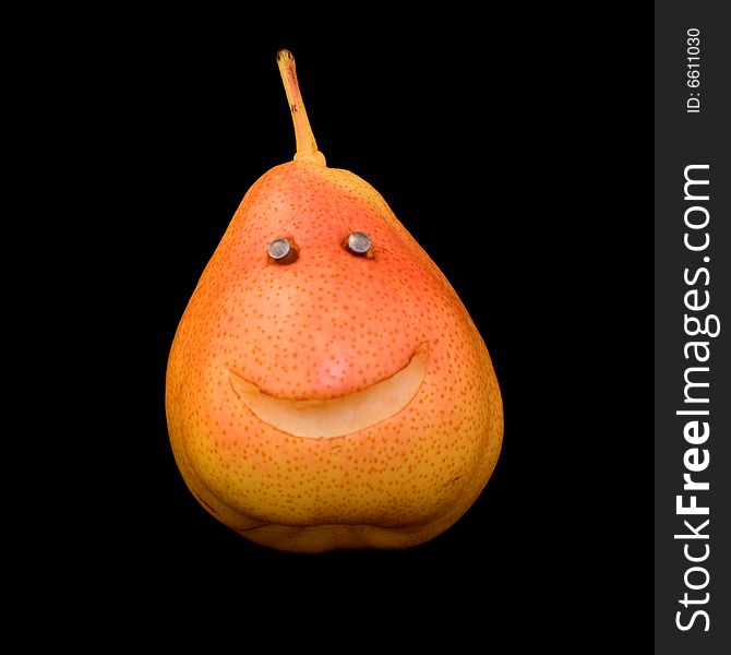 The smiled pear on the black background