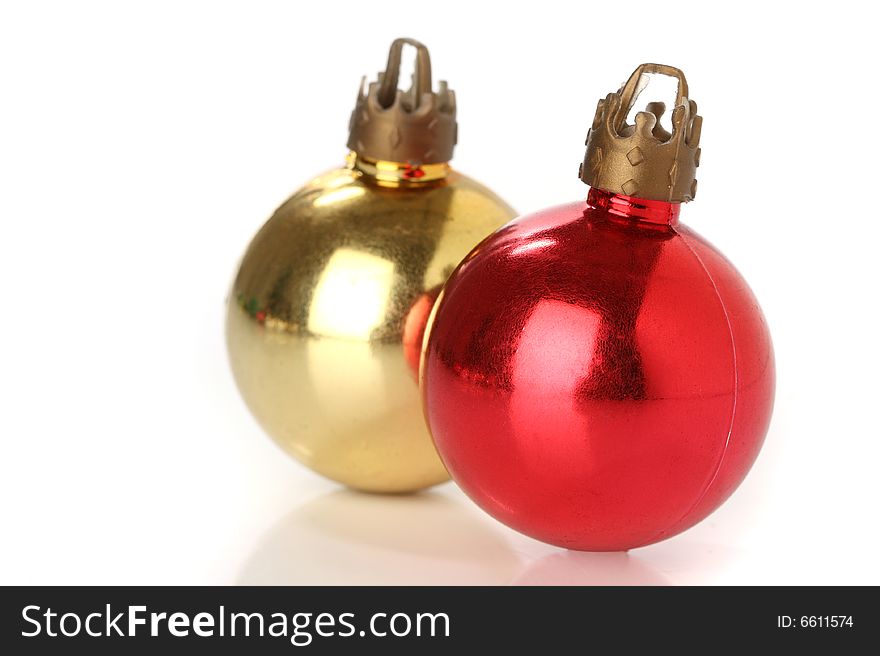 Two christmas balls over white background