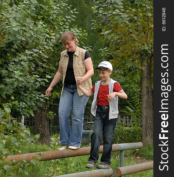 Boy With Mother Outdoor Sports