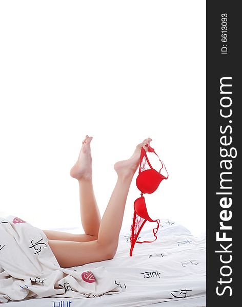 Picture of beautiful woman's legs with red bra. Picture of beautiful woman's legs with red bra