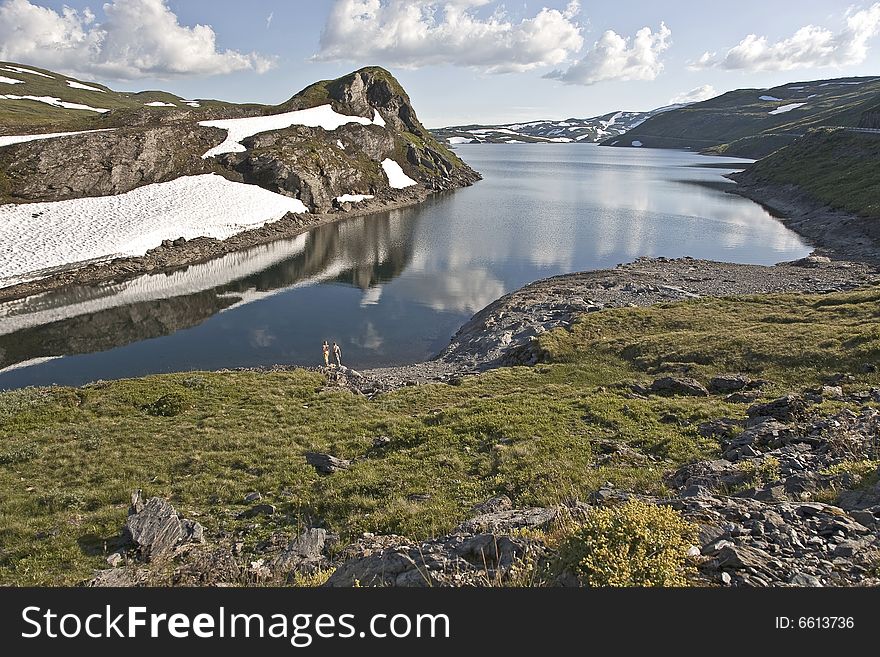 A landscape south of Vik/Sognefjord, up in the mountains, in the summer, with some kids. A landscape south of Vik/Sognefjord, up in the mountains, in the summer, with some kids.