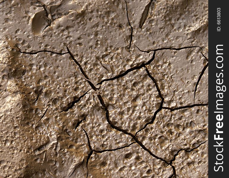 A close-up shot of some dried up mud. A close-up shot of some dried up mud.