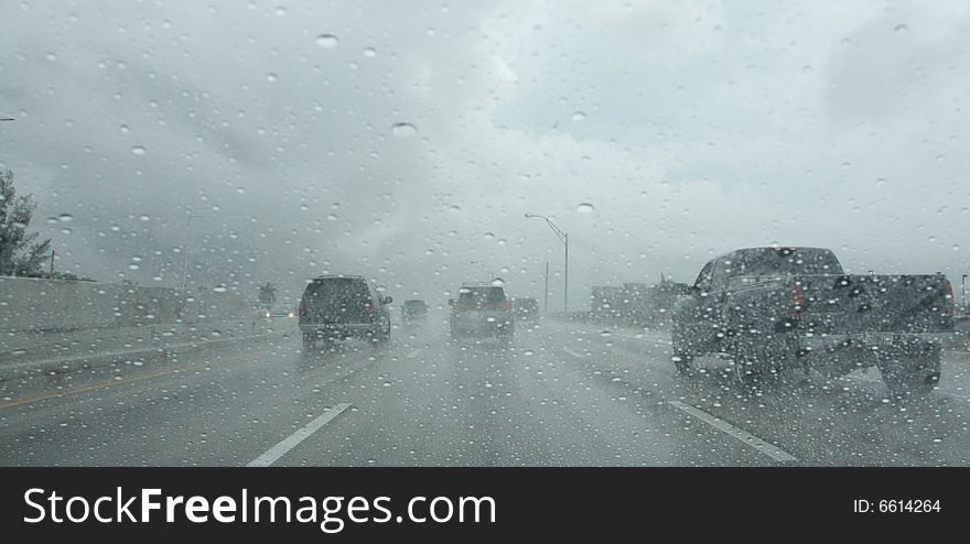 Driving down the highway during a storm. Driving down the highway during a storm