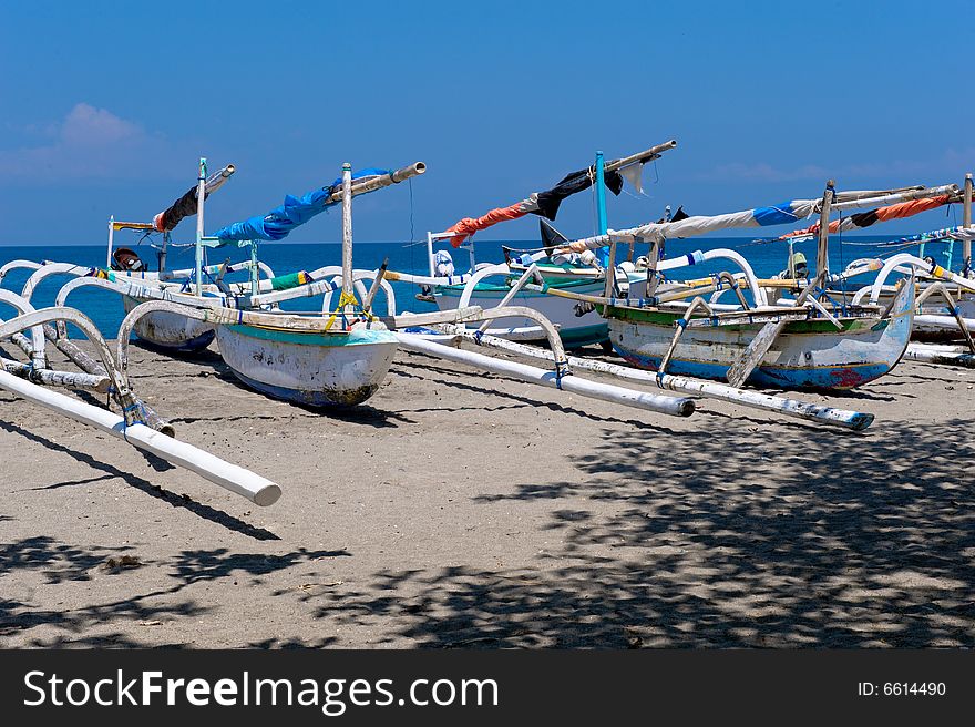 Photo of traditional boats on the beach