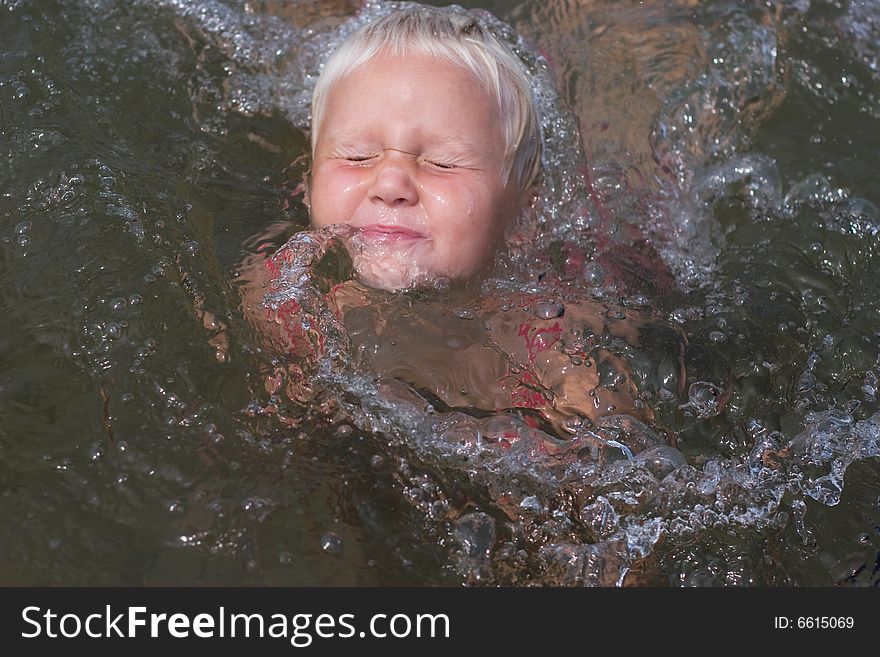 Girl swimming in the water. Girl swimming in the water