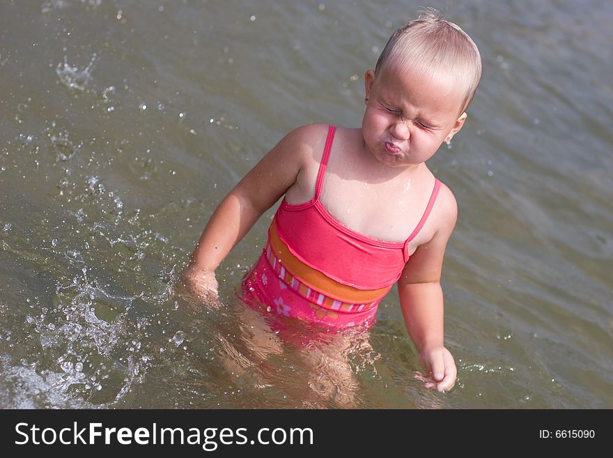 Girl holding her breath and going swimming. Girl holding her breath and going swimming
