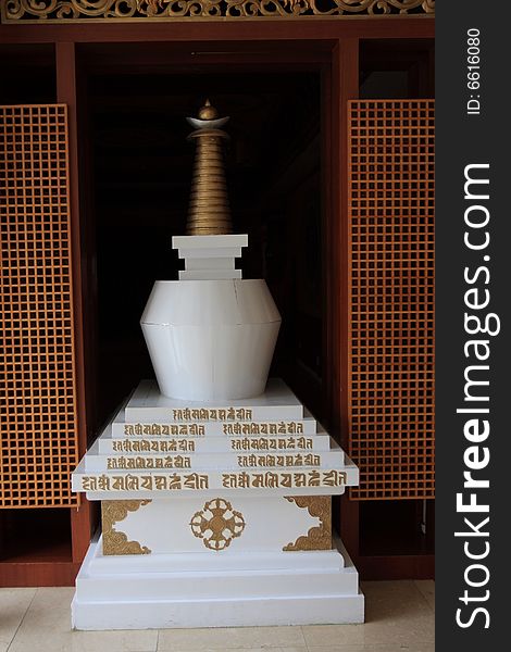 White holy buddha stupa with tibert words