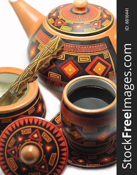 A hand made and decorated coffee cup, with some more elements. A hand made and decorated coffee cup, with some more elements.