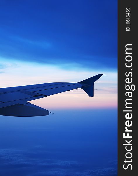 Airplane S Wing On A Cloudy Sky