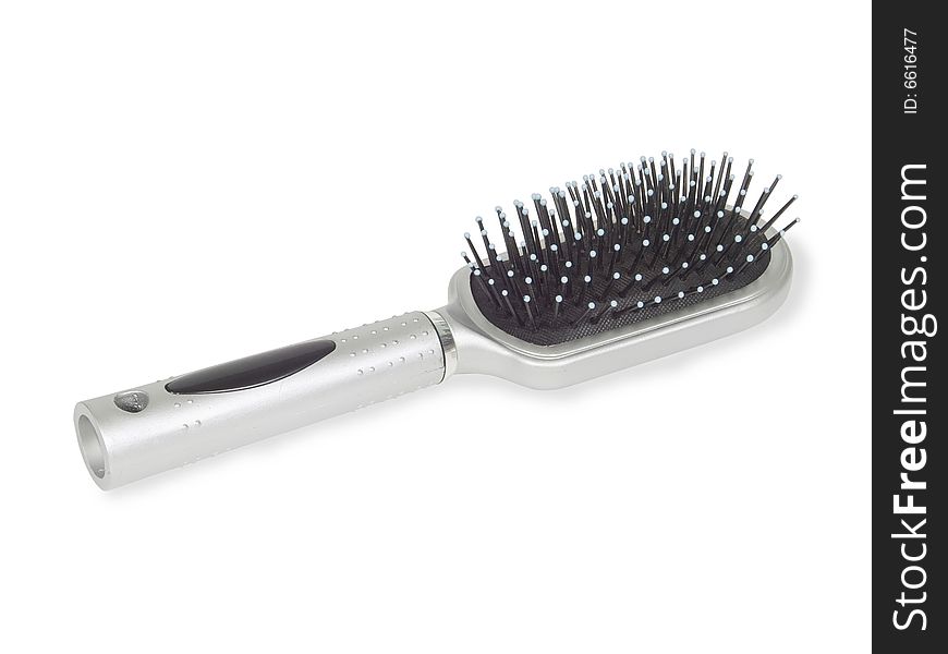 Massage hairbrush isolated on a white background