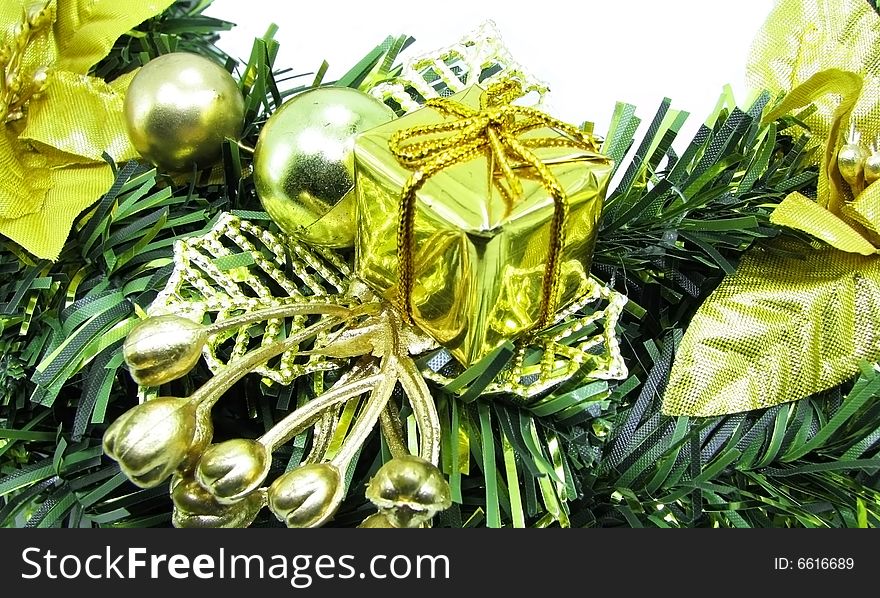 Beautiful christmas ornament with a golden gift. Beautiful christmas ornament with a golden gift.