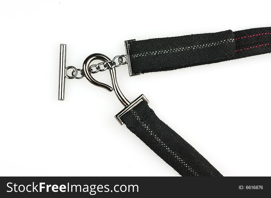 Black belt with metal buckle isolated on a white background