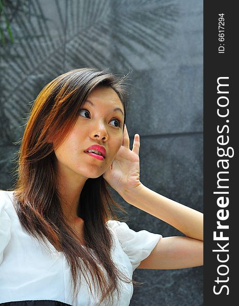 Asian Girl Hand Gesture - Hearing 2