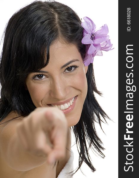 Woman pointing at camera on an isolated white background. Woman pointing at camera on an isolated white background