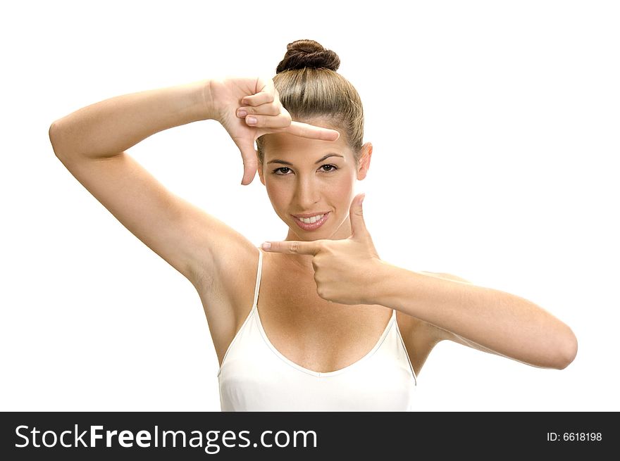 A white woman showing framing hand gesture