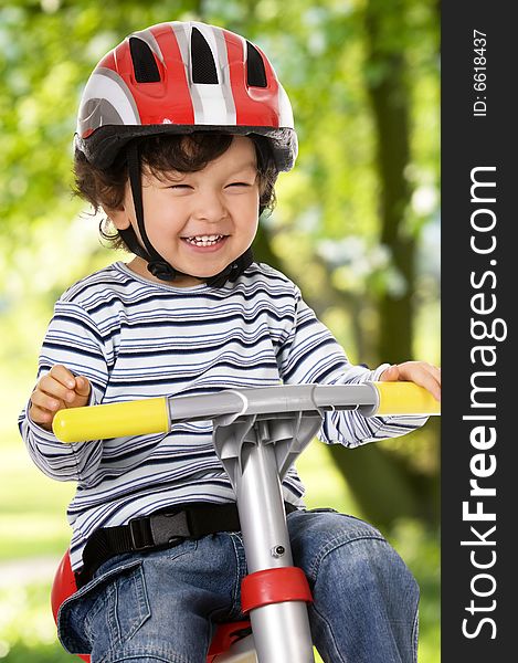 Little boy riding bicycle outdoors. Little boy riding bicycle outdoors