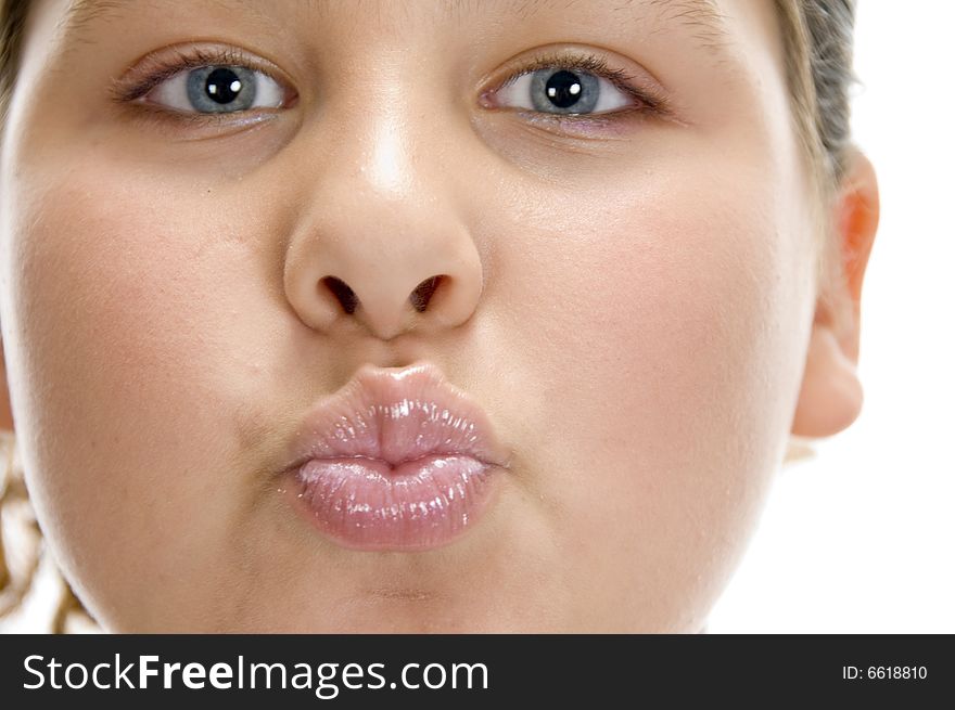 Girl making pout mouth on an isolated white background