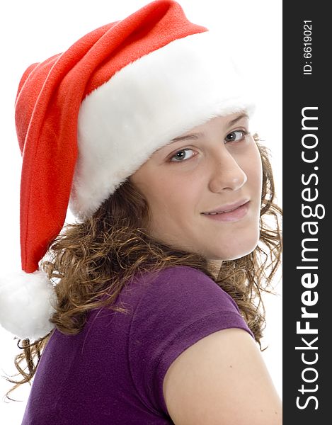 Lady posing with santa cap on an isolated background