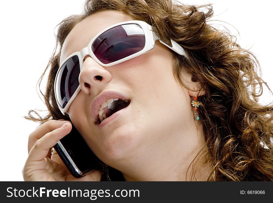 Female talking on cell phone on an isolated background