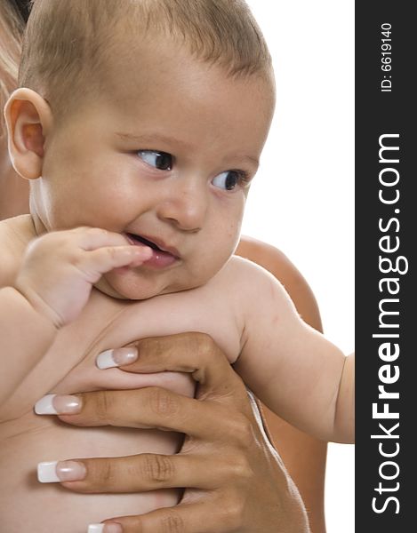 Cute baby sucking his fingers on an isolated white background