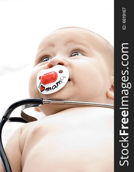 Cheerful child with stethoscope with white background