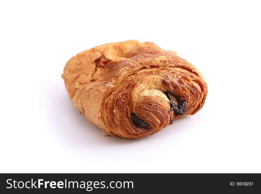 A chocolate filled french croissant isolated
