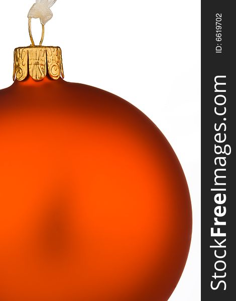 Vibrant orange Christmas Bauble on isolated white