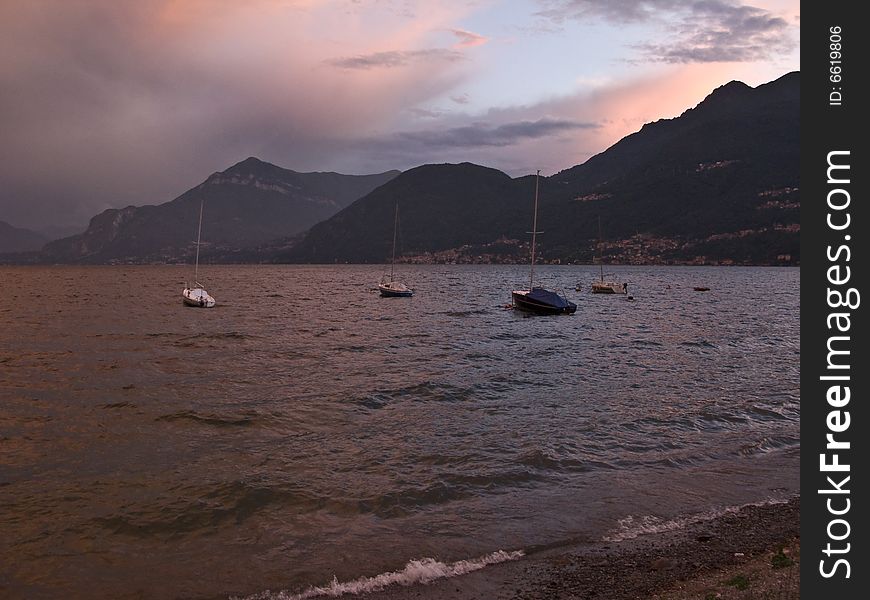 Sunset at lake Lago di Commo, Italy. A storm was approaching. Sunset at lake Lago di Commo, Italy. A storm was approaching.